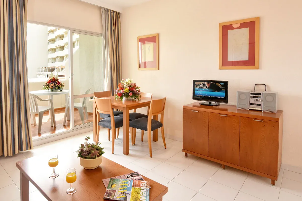 Studio with balcony, dining table and living area at CLC Benal Beach Aparthotel